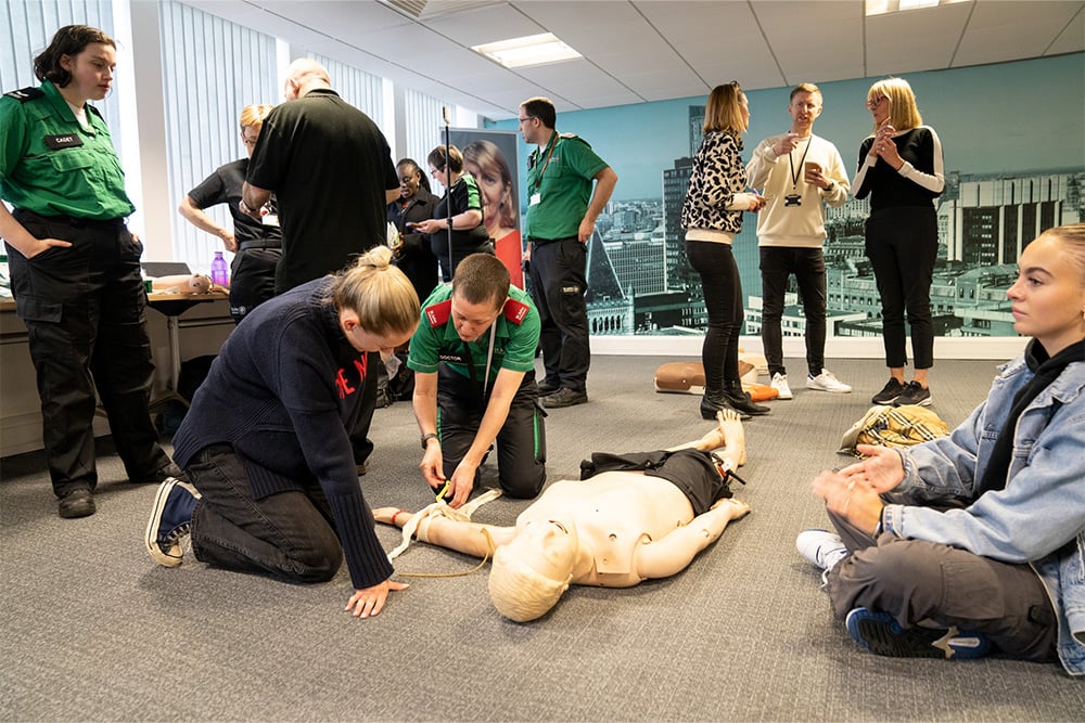 People taking part in a first aid course.